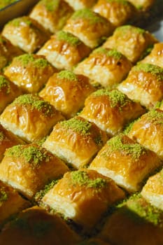 Freshly made baklava topped with pistachios at the market stall today.