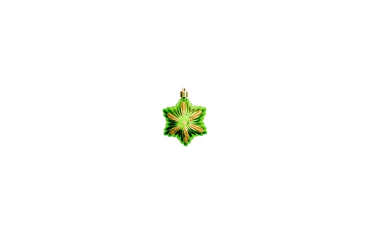 Green shiny Christmas tree toy star isolated on white background.Details for new year and Christmas holidays atmosphere, design of greeting card banner.