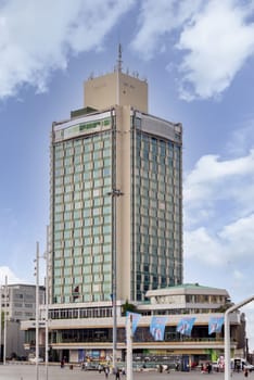 Istanbul, Turkey - May 13, 2023: Exterior of modern architectural design tall building of five stars Marmara hotel, located at Taksim Square, or Taksim Meydani in a spring day