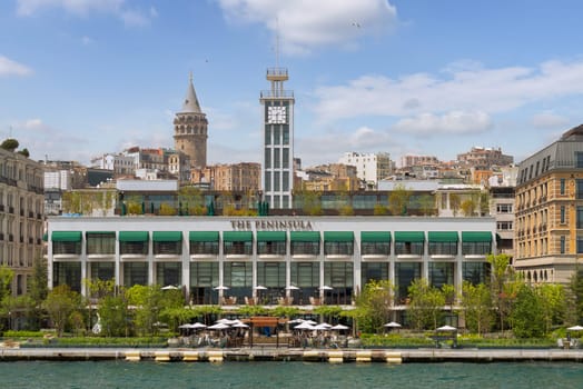 Istanbul, Turkey - May 8 2023: Exterior of modern architectural design building of Grand Tarabya five stars hotel, suited by Bosphorus Strait, at Sariyer district, in a summer day