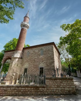 The Burmali Mosque, or Burmali Minare Camii, a 16th century Ottoman mosque built in 1550 on behalf of Emin Nuretti Efendiin, suited in Sarachane park, Fatih district, Istanbul, Turkey