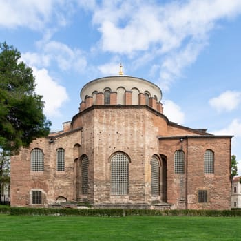 Side view of Hagia Irene, or Holy Peace Church, an old Byzantine style Eastern Orthodox church, located in the outer courtyard of Topkapi Palace, Istanbul, Turkey