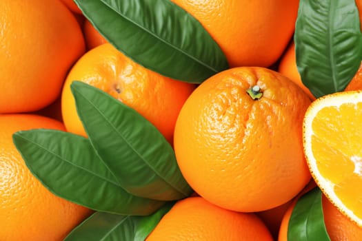 Image of fresh orange fruits with leaves. An orange is a fruit of various citrus species in the family Rutaceae
