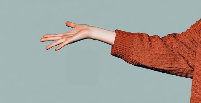 A woman's hand, in a burnt orange sweater, extends outward, palm up, against a muted teal background.