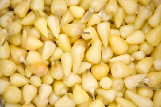 Close-Up of Fresh Yellow Chili Peppers in a Pile.