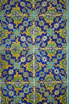 Intricate tiles feature floral and geometric designs in vibrant colors.