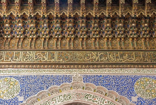 Architectural background. Closeup view of a decorative Arabic facade of a house in the medina of Fes. Morocco. Horizontally. 