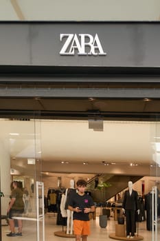 Crete, Greece - April 7, 2025: Stylish Zara retail store featuring large glass windows, contemporary architecture, and vibrant displays, attracting shoppers in a lively commercial district.
