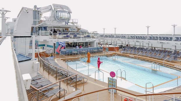 Exciting and Colorful Waterslide on a Cruise Ship with Stunning Ocean Views for Thrilling Fun. New York NY USA - 09.02.2024.