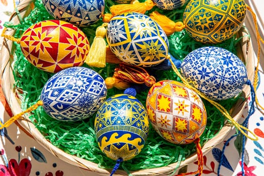 A beautiful collection of Easter eggs features traditional Ukrainian pysanky adorned with elaborate folk patterns.