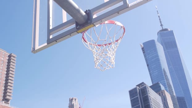 New York City, United States - 31 Aug 2023: World Trade Center, Manhattan Downtown Financial district USA. Hudson River Park basketball court. Basket ball hoop and blackboard. Outdoor streetball sport