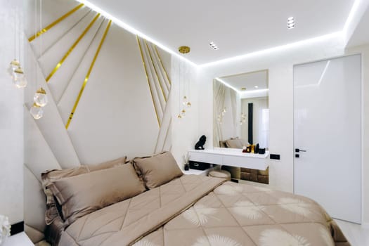 A cozy and inviting bedroom furnished with a comfortable bed, a stylish dresser, and a wellplaced mirror for functionality and aesthetics