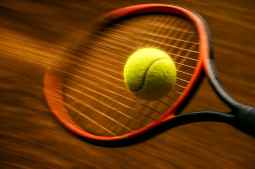 Close-up of a tennis ball striking a racket with force and speed. Symbol of precision, power, and competitive motion in tennis.