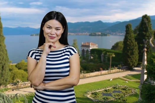 Portrait of asian woman against resort landscape background. Sea vacation background.