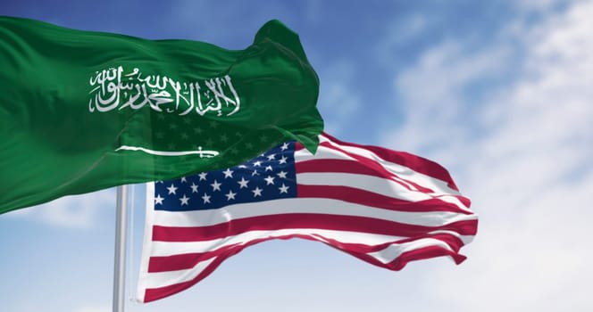 3D render of Saudi Arabia and United States flags waving side by side. Symbol of international identity, patriotism, and cultural unity between East and West