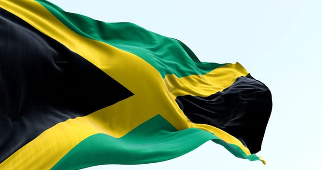 High-resolution 3D render of the Jamaican flag fluttering in the wind. Iconic yellow saltire represents national pride, freedom, and Caribbean identity. Perfect for editorial and tourism use