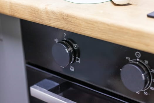 Close up of the timer and mode relays of the oven