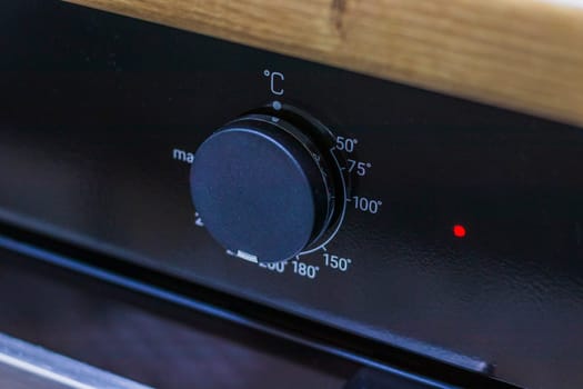 Close up of the thermometer relay of the oven