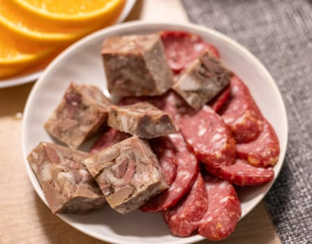 Cuts of different type of cold meats on the plate