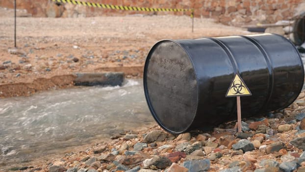 Close up of industry oil fuel tank spilling water pollution, Conserve water and Environment Issue, biohazard caution of collects sample of waste from industrial