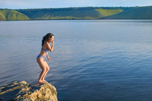 the sport or activity of propelling oneself through water using the limbs