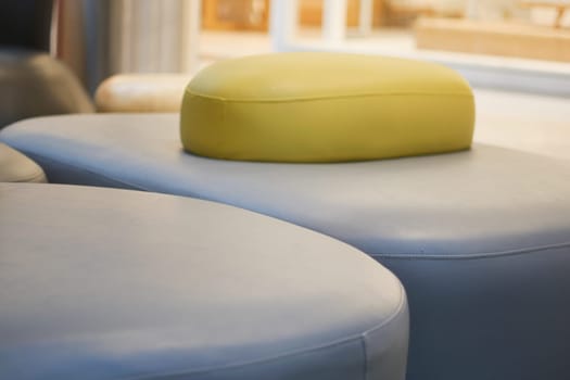 Stylish seating design with modern shapes and vibrant cushions displayed.