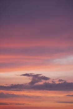 The sky is painted with hues of purple, pink, and orange at dusk.