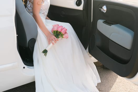 Bouquet of flowers in the hand of the bride.