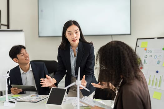 A focused group discussion on ESG and renewable energy strategies reflects the teams dedication to driving sustainable change within their organization.