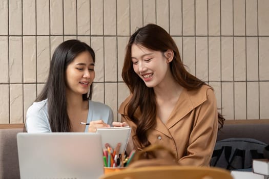 In an inviting cafe, these students share creative insights and practical knowledge, making their study session both fun and informative.