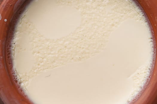 full cream yogurt served in a traditional earthen pot.