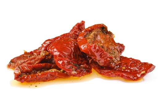 A vibrant pile of sun-dried tomatoes glistens in the light, showcasing their rich red color and slight sheen from the oil. Perfect for enhancing dishes or enjoying as a healthy snack.