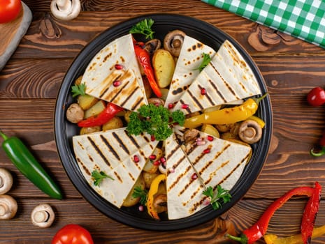 A beautifully arranged platter showcases grilled quesadillas with a variety of filling sliced into wedges.