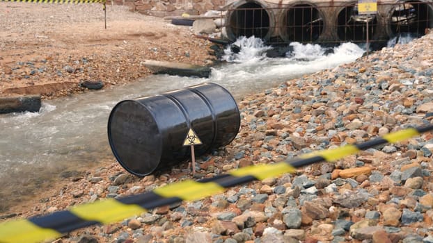 Close up of industry oil fuel tank spilling water pollution, Conserve water and Environment Issue, biohazard caution of collects sample of waste from industrial
