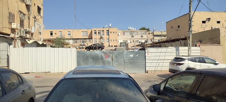 November 5 2024 Beer-Sheva city Israel , Construction site cars building architecture street windows shotlisttravel travel tourism transport summer day . High quality photo