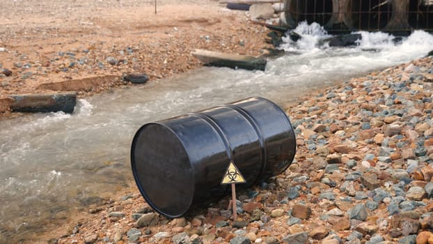 Close up of industry oil fuel tank spilling water pollution, Conserve water and Environment Issue, biohazard caution of collects sample of waste from industrial