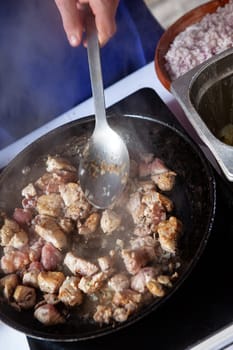 Cooking pork in a pan