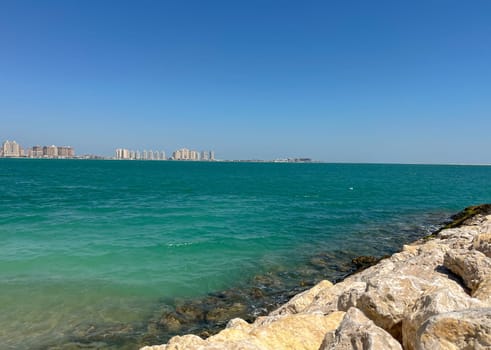 clean and modern sandy beach in Doha, Qatar