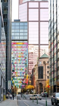 Montreal, QC Canada - 3.12.2025: Colorful Mural on Urban Building Brings Life to City Street Scene.