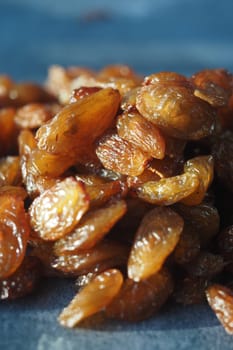 Golden raisins are arranged neatly, showcasing their natural shine and texture.