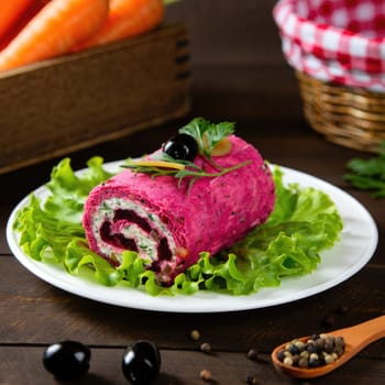 A visually striking roll made from beetroot and cream cheese is presented on a white plate. It is garnished with fresh lettuce and olives, creating a colorful and appealing dish.