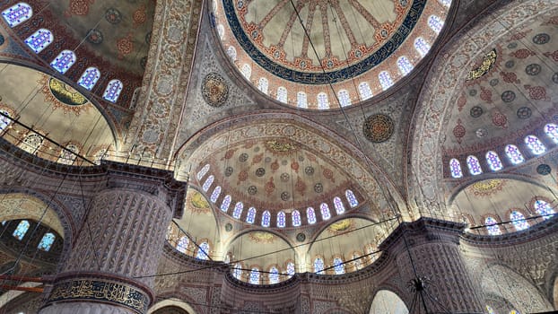Intricate details of mosque ceilings and domes display stunning artistry.