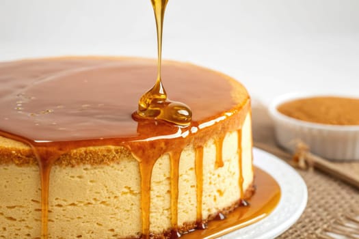 Golden syrup cascades down the sides of a creamy cheesecake, enhancing its rich texture and inviting appearance.