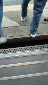 Gap platform train shotlisttravel people men tourism tourist travel road crossing walking street . High quality photo