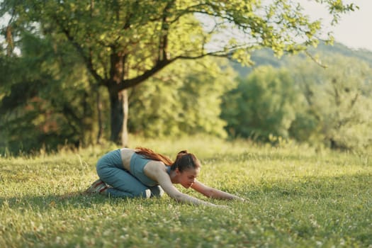 A young woman engaged in yoga outdoors, surrounded by greenery, emphasizing calmness and wellness The natural background creates a serene atmosphere for yoga practice