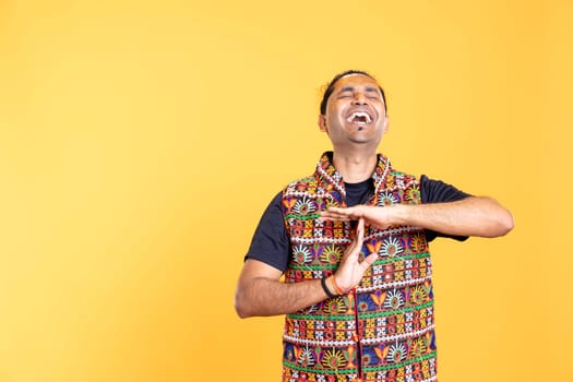 Portrait of happy man laughing too hard, asking for timeout after running out of breath. Amused cheerful person doing pause sign gesturing, wishing for break, having too much fun, studio background