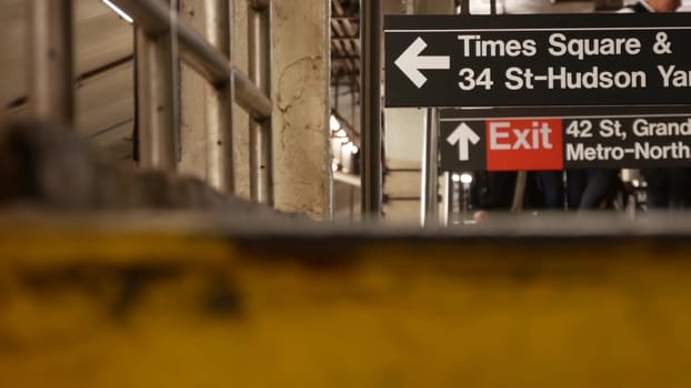New York City, United States - 31 Aug 2023 Subway station interior, underground metropolitan platform. Public metro transportation. Railway passenger traffic. Text sign Times Square, Grand Central, 42