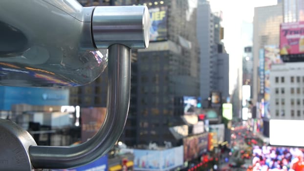 New York City, United States - 14 Sept 2023: Times Square Manhattan Midtown Broadway street, USA. People crowd from above. NYC commercial billboard screens. Tower viewer binoculars, tourist viewpoint.