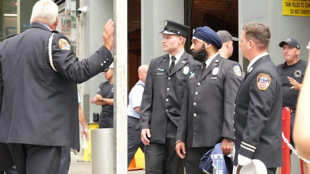 New York City, United States - 11 September 2023: Firefighters celebrate Patriot Day. 911 memorial remembrance event, FDNY commemorate anniversary. Fire Department Station, Manhattan 10 Ten Firehouse.