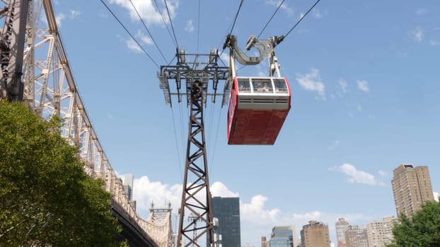 New York City, United States - 4 Sept 2023: Roosevelt Island tramway to Manhattan Midtown streets. American cable tram, Queensboro Bridge. Urban public transport, USA. Building architecture cityscape.
